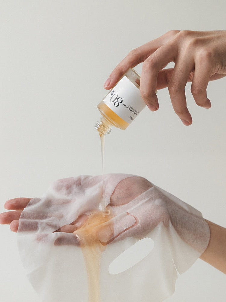 sheet mask on hand