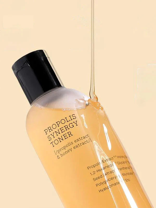 honey dripping on bottle